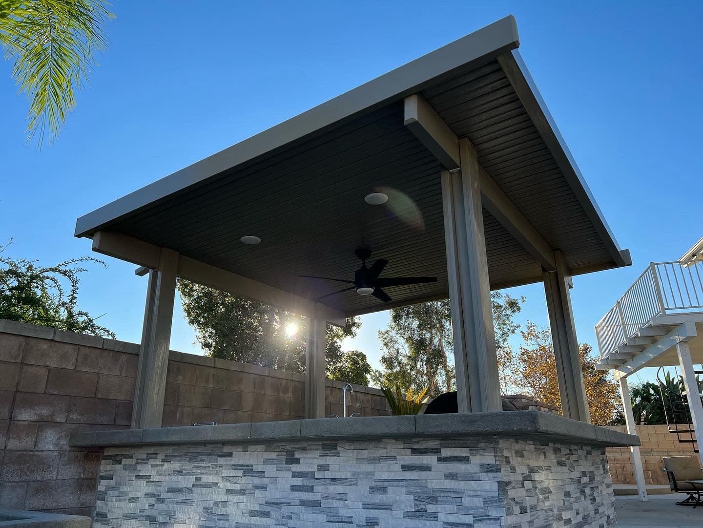 Project Transform Your Backyard with Sleek Outdoor Kitchen image